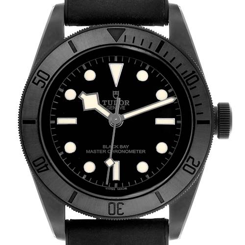 The Tudor Heritage Black Bay watch is shown from the front, highlighting the dial, bezel, and crown.